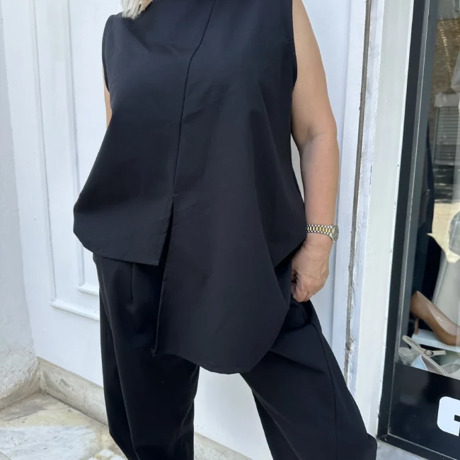 ONE SIZE Μάυρο ελαστικό ασύμμετρο σέτ που προσφέρει άνεση και στύλ για όλες τις ώρες της ημέρας. Καλύπτει στήθοσ 110 μέση 110  περιφέρεια  130 Εχει ελαστικότητα